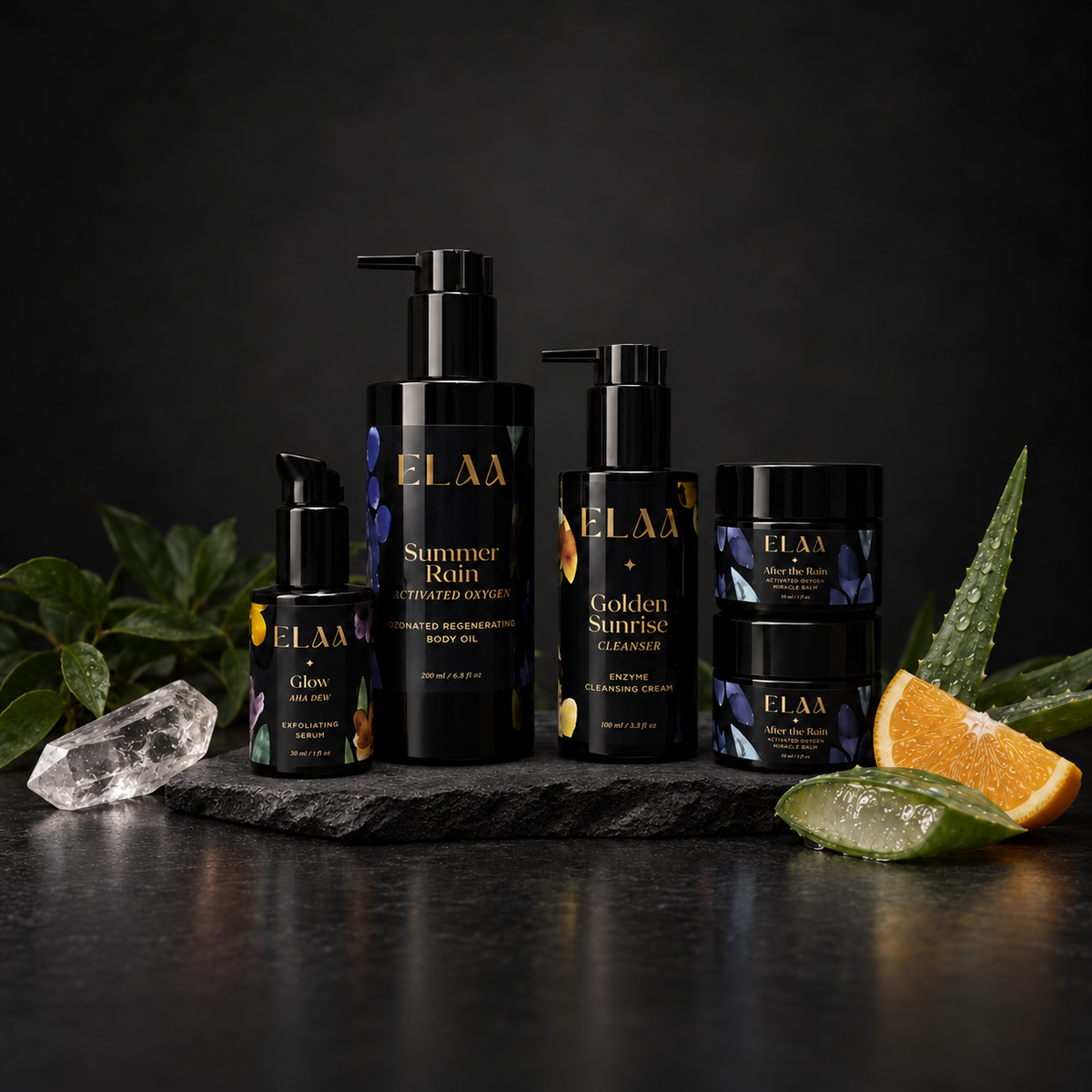 ELAA Acne-Prone Skin collection arranged on dark slate with softly lit packaging