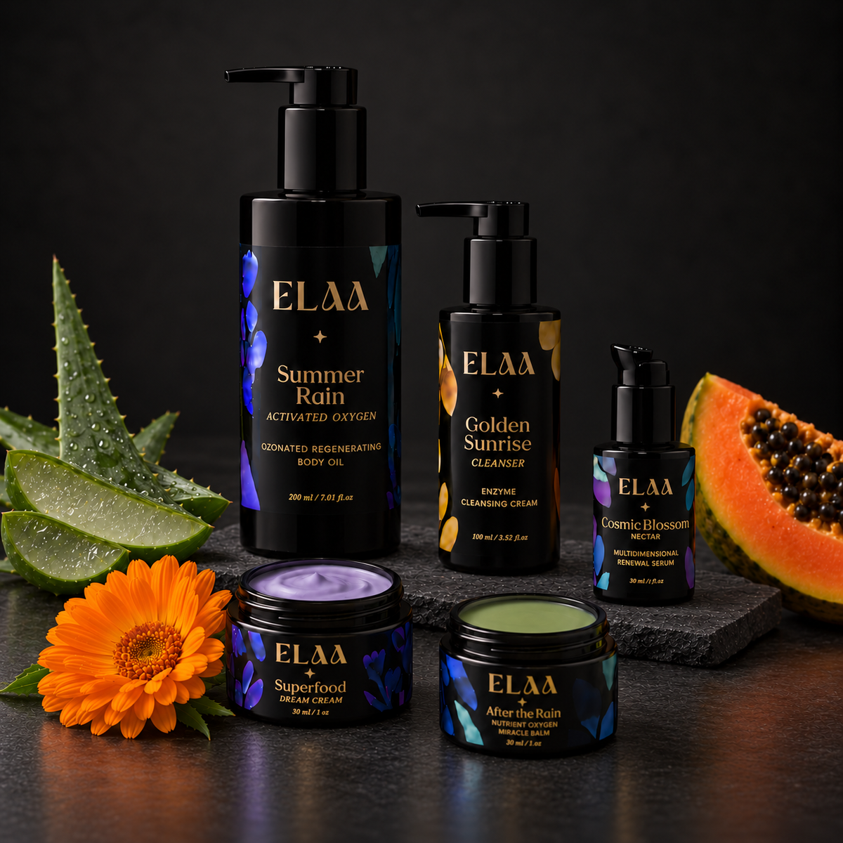 ELAA Elaa Ritual Collections collection arranged on dark slate with softly lit packaging