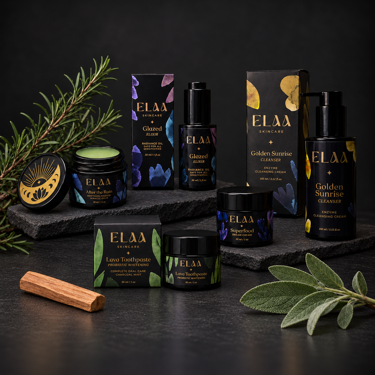 ELAA Men collection arranged on dark slate with softly lit packaging