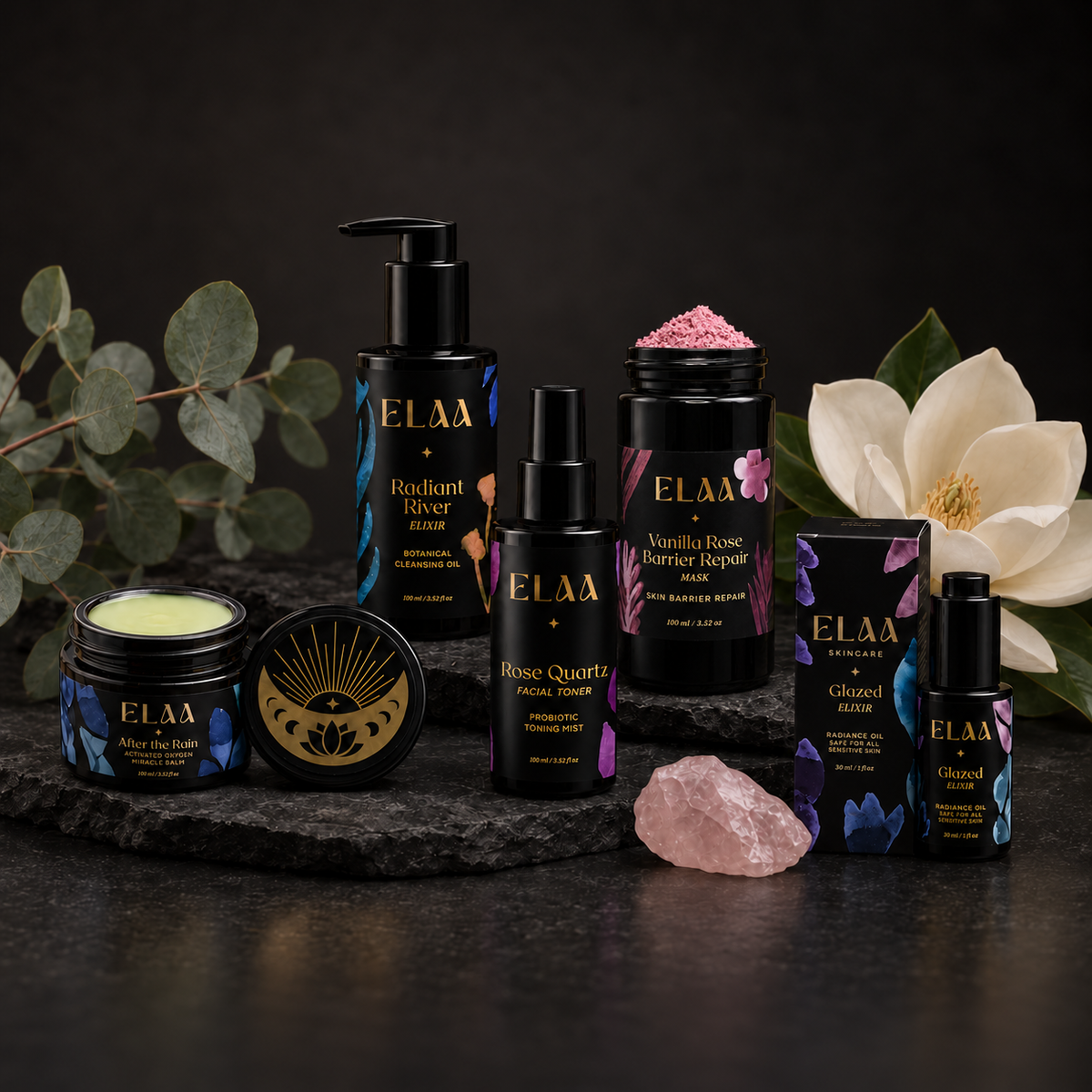 ELAA Calm & Comforted Skin collection arranged on dark slate with softly lit packaging