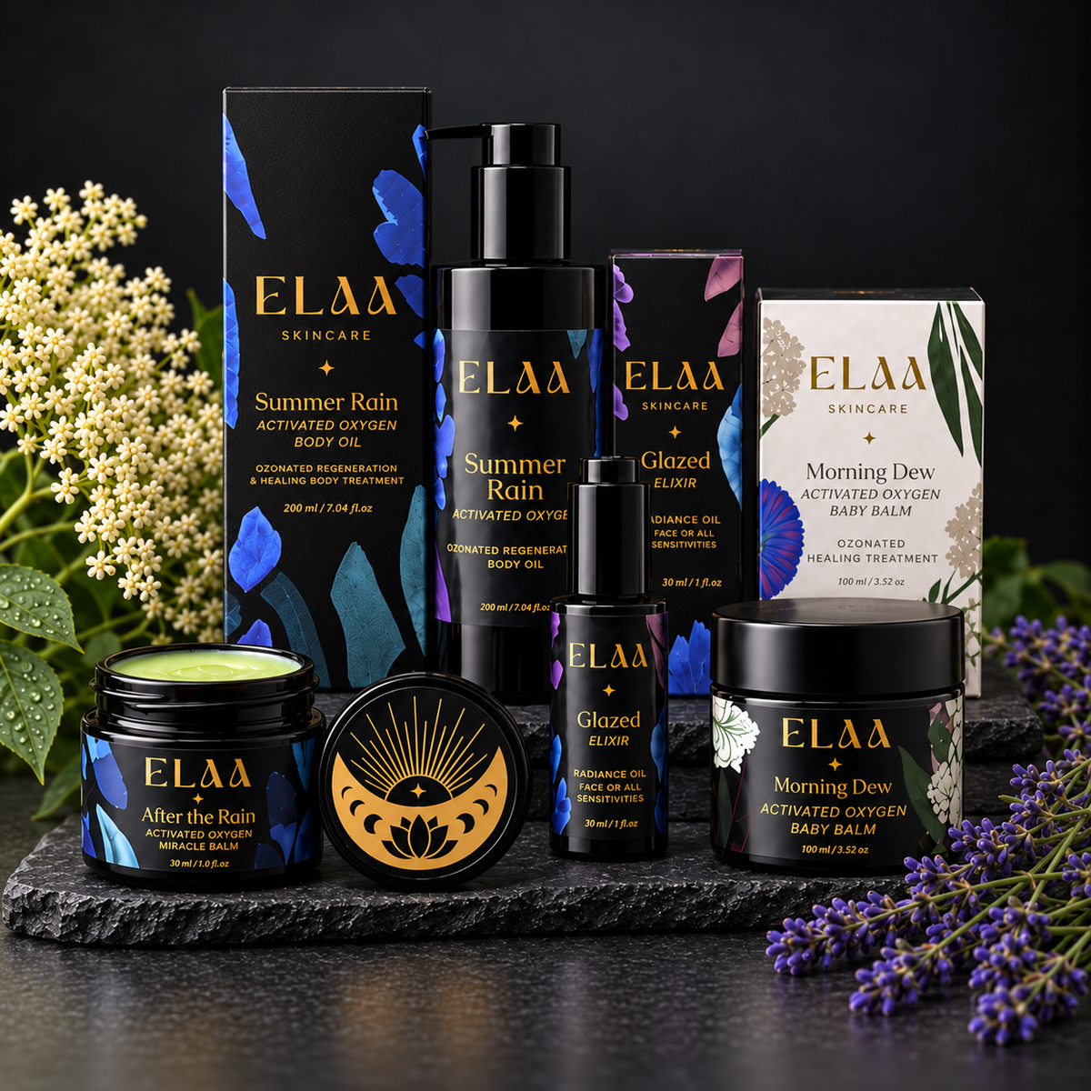 ELAA Skin Conditions collection arranged on dark slate with softly lit packaging