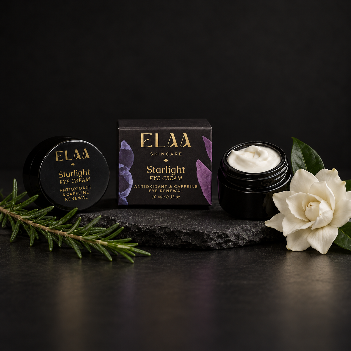 ELAA Eyes collection arranged on dark slate with softly lit packaging