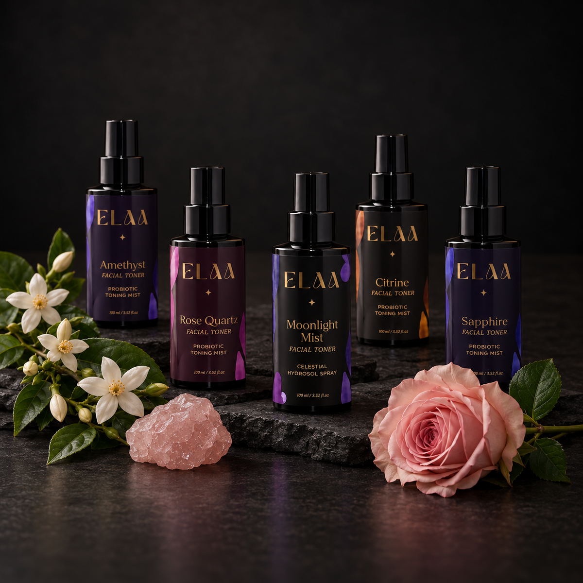 ELAA Toners / Mists collection arranged on dark slate with softly lit packaging