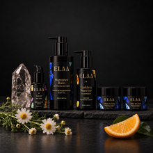 ELAA Acne Ritual product ritual arranged on dark slate with softly lit packaging