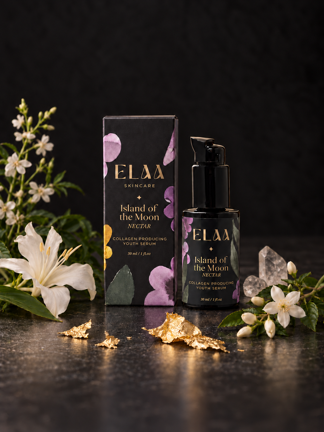ELAA Island of the Moon Nectar bottle and carton with white flowers, quartz and prominent gold leaf on dark stone